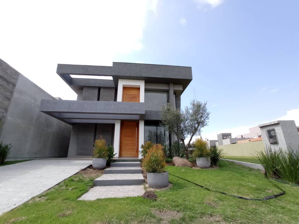 Casa em Condomínio 4 dormitórios para venda, CAPÃO ILHAS RESORT em Capão da Canoa | Ref.: 10445